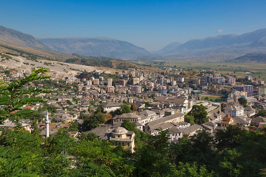 Gjirokastra or Gjirokaster, Albania. Looking across the typical architecture of the old town to new suburbs HD wallpaper