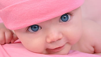 baby with blue eyes and dimples