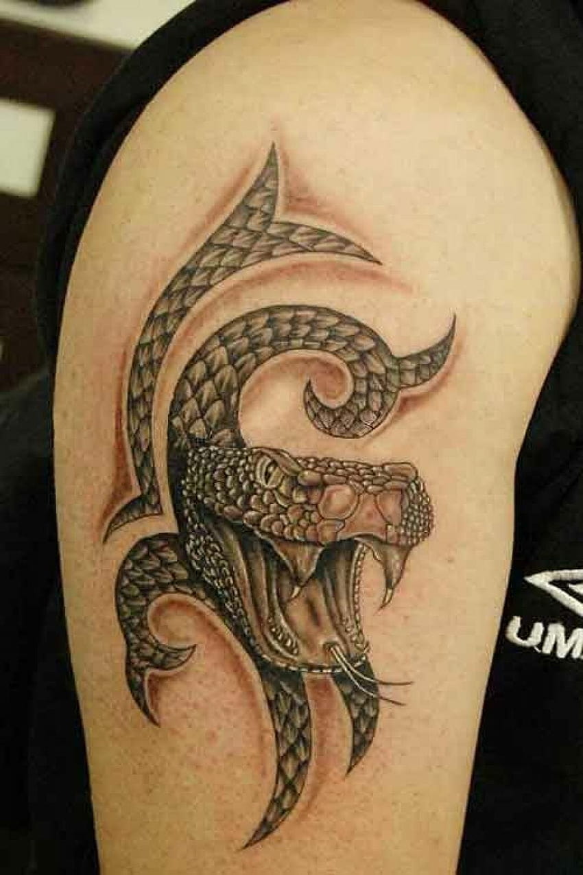 Line art snake tattoo on the top of the shoulder