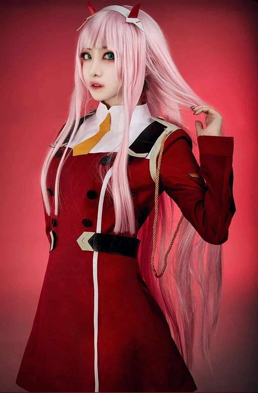 Zero Two anime cosplay girl in suit hold, Stock Video