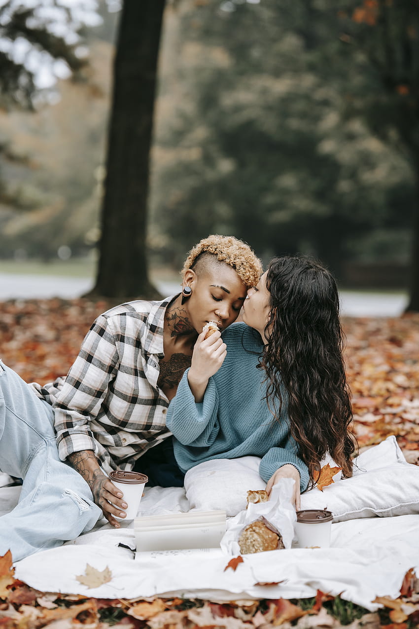 Attractive boyfriend and girlfriend with European appearance pose for  making selfie, hold smart phone, pose against nature background, have fun  together. Youth, lifestyle and technology concept Stock Photo | Adobe Stock