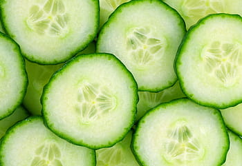 Premium Photo  Set of fresh whole and sliced cucumbers on a green  background with water drops garden cucumber wallpaper backdrop design
