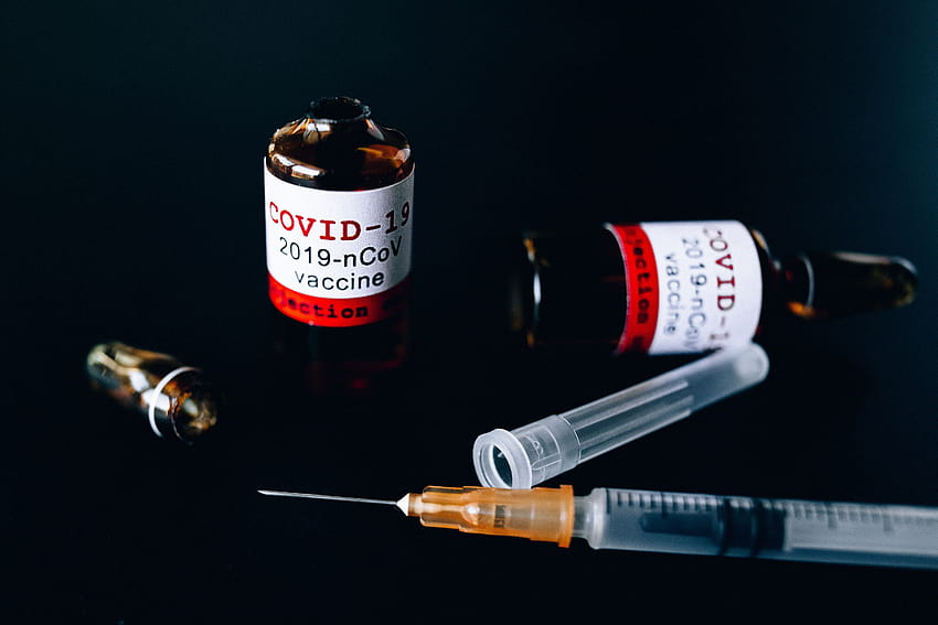 Covid Vaccine Bottles and Syringe · Stock HD wallpaper