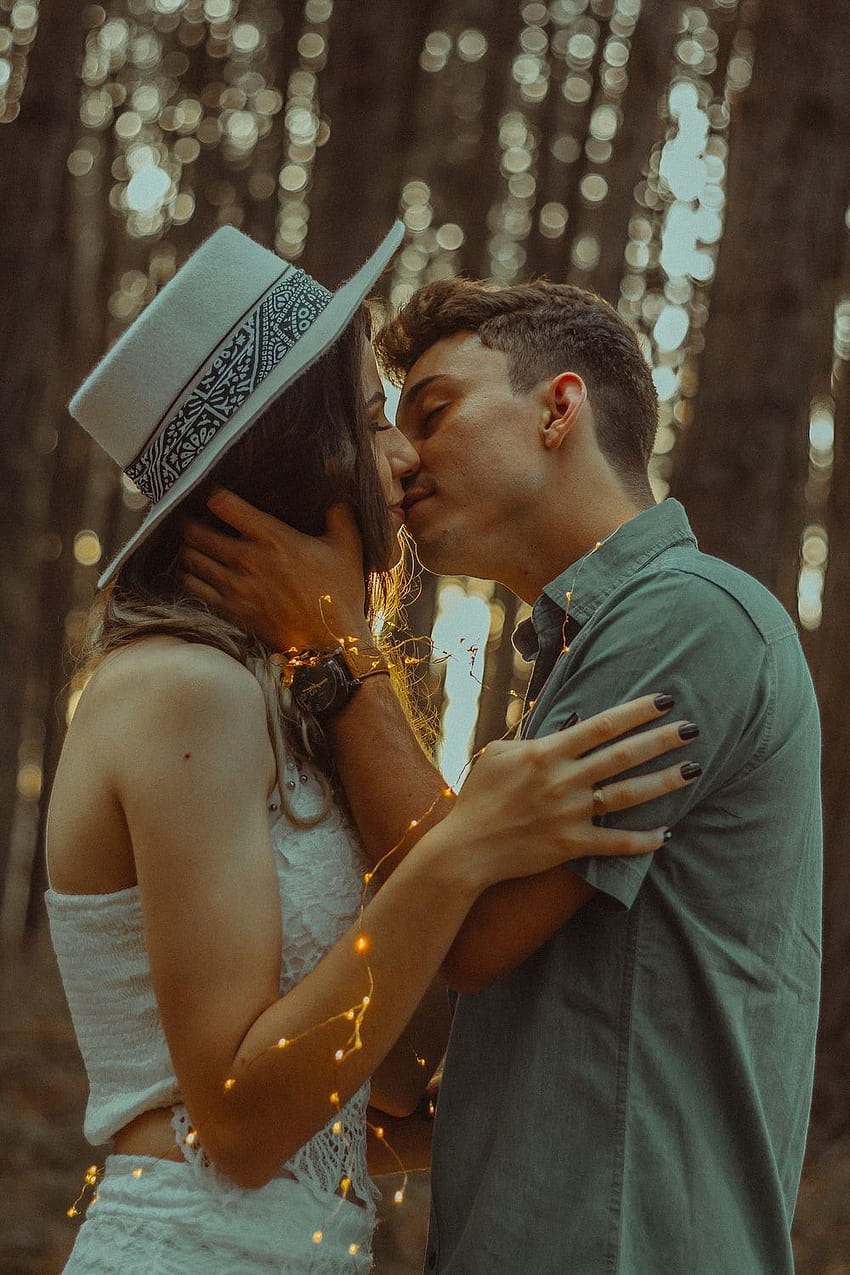 Premium Photo | Boyfriend lifting girlfriend in forest